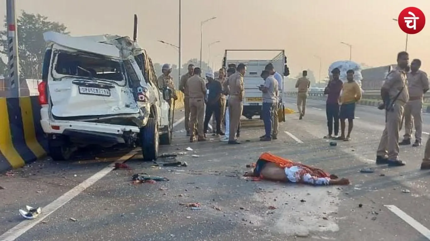 Police investigate the scene following a horrific accident in Varanasi; a body lies on the road
